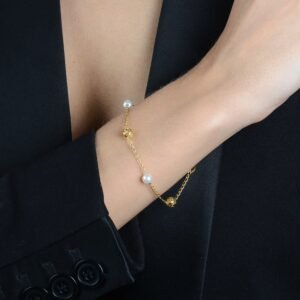 Pulseira Dourada de Pérolas e Esferas